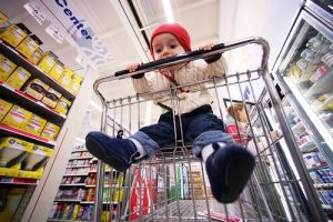 baby in shopping cart